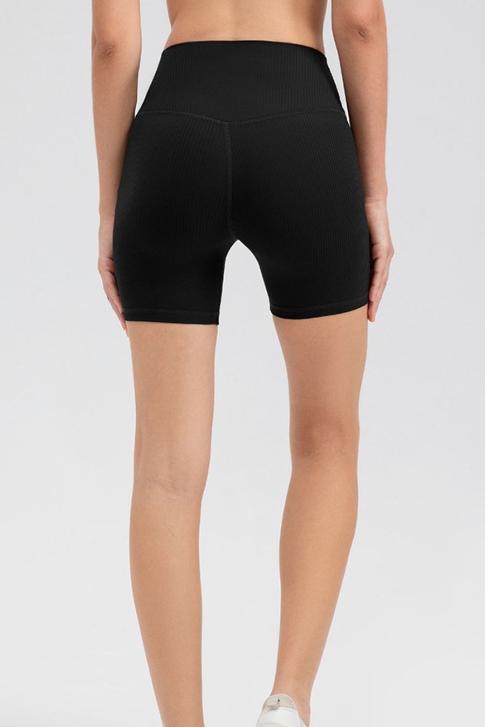 Black ribbed contour active bike shorts with a high waist.