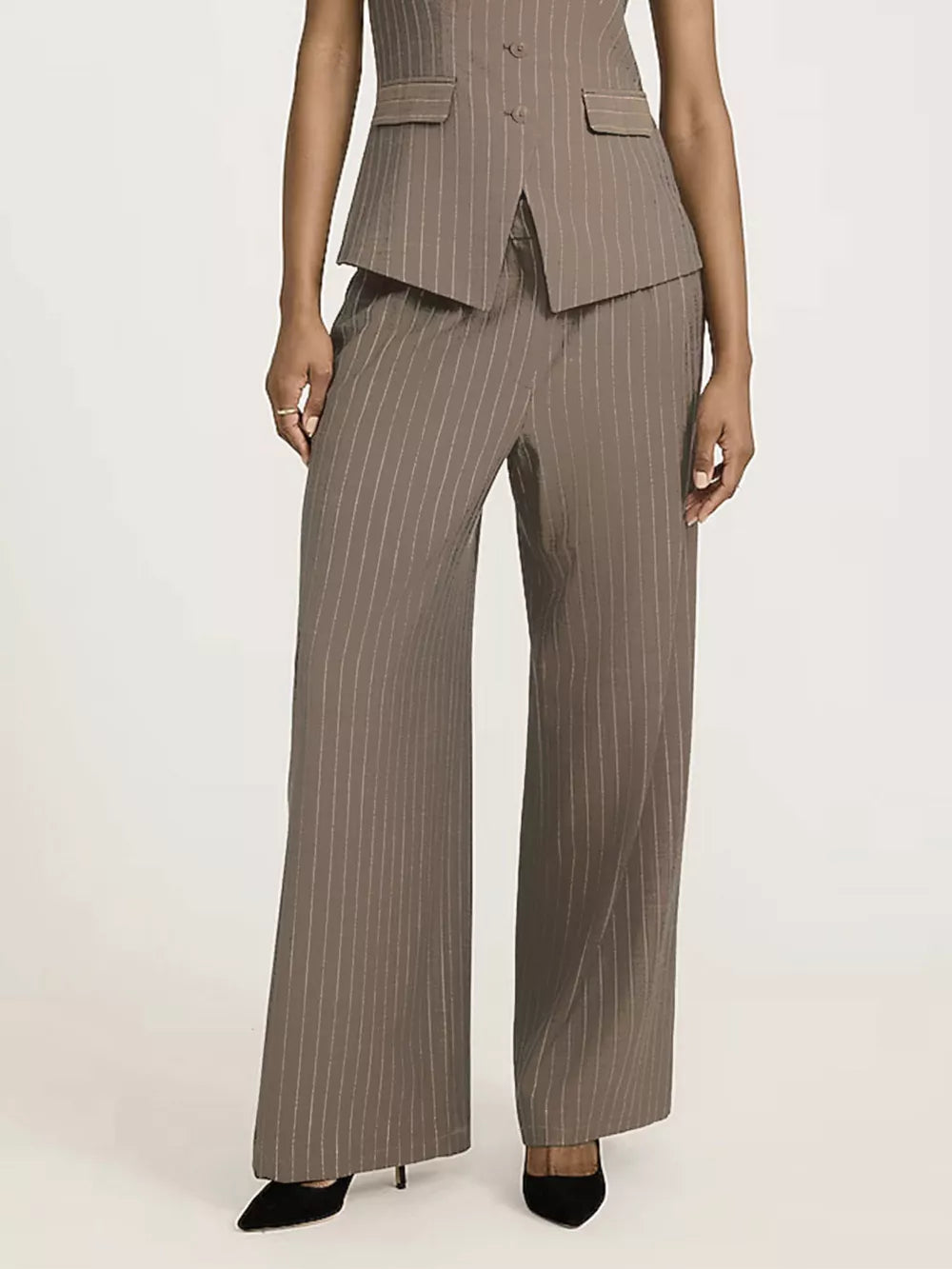 Elegant high-waisted beige pinstripe maternity trousers with a wide leg.