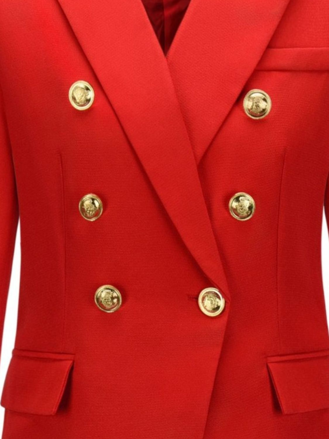 Red double-breasted blazer with gold buttons and flap pockets.