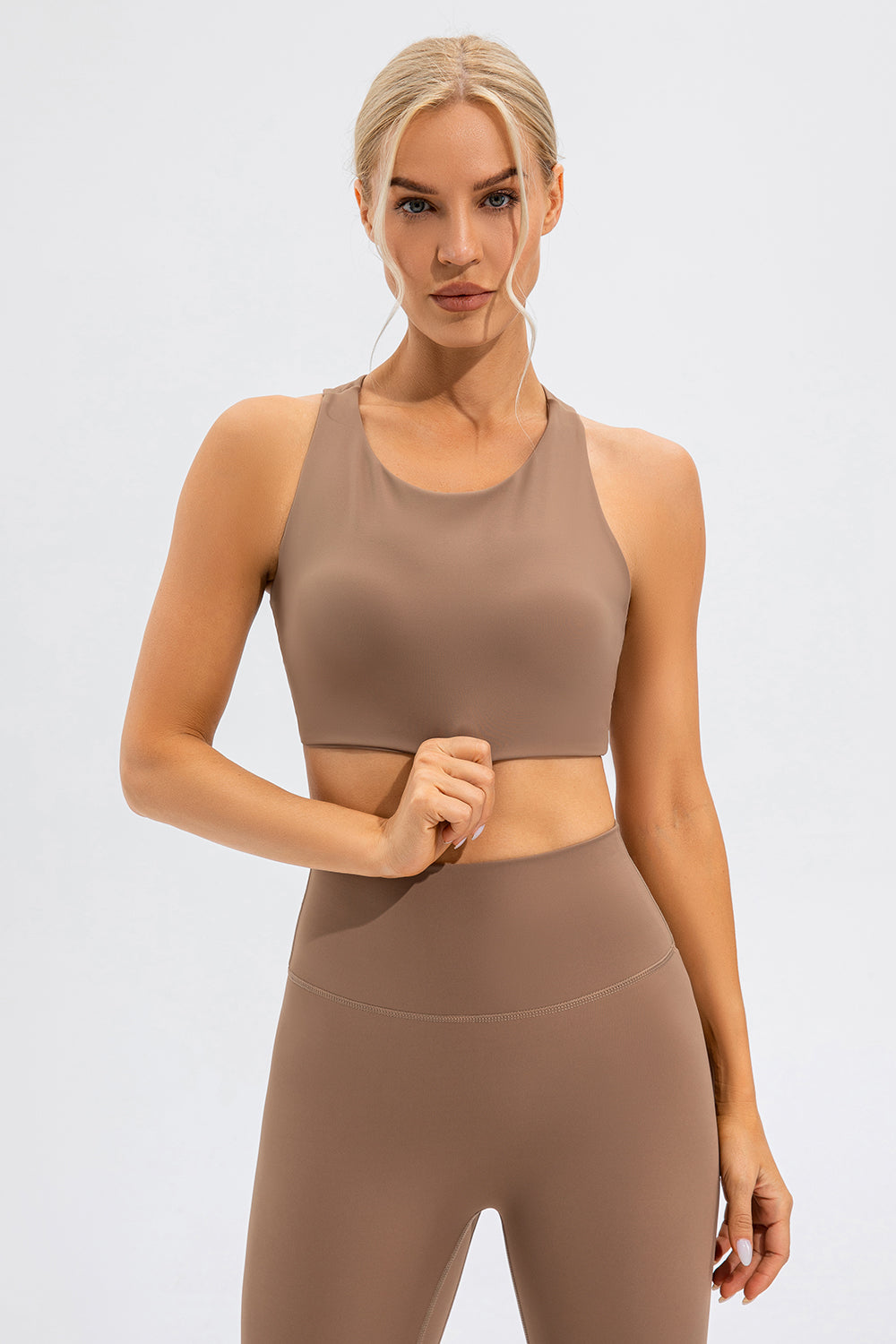 Camel asymmetric cutout sports bra with racerback detail