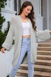 Light Gray textured knit cocoon cardigan with balloon sleeves and open front.