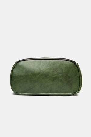 Dark green structured leather convertible backpack bottom view