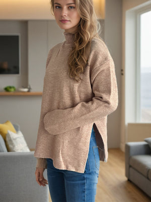 Camel ribbed turtleneck sweater with side slits and a casual fit.