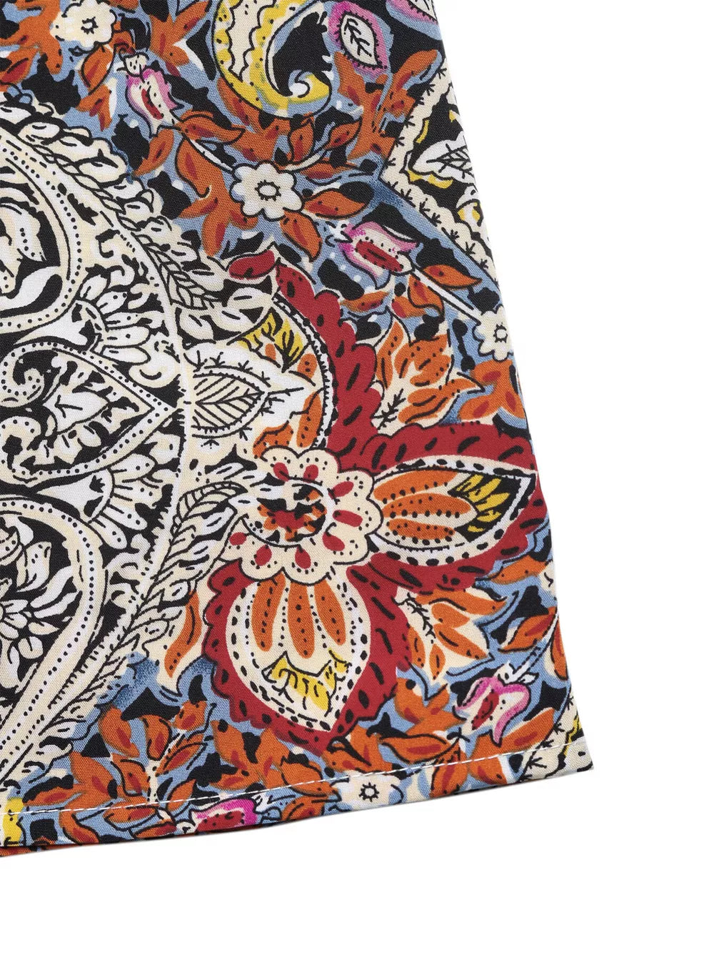 Paisley print midi dress with tie neck, featuring a vibrant floral pattern in red, orange, yellow, and blue.