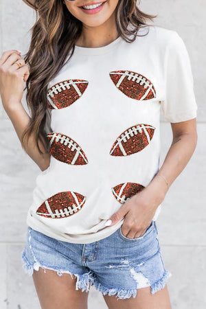White sequin football graphic tee with short sleeves.