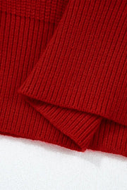 Red ribbed knit sweater with a folded detail.