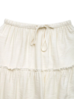 Cream tiered midi skirt with drawstring waist and ruffled seams