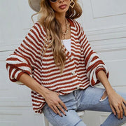 Wide stripe button-up knit cardigan in chestnut and white with wide sleeves.