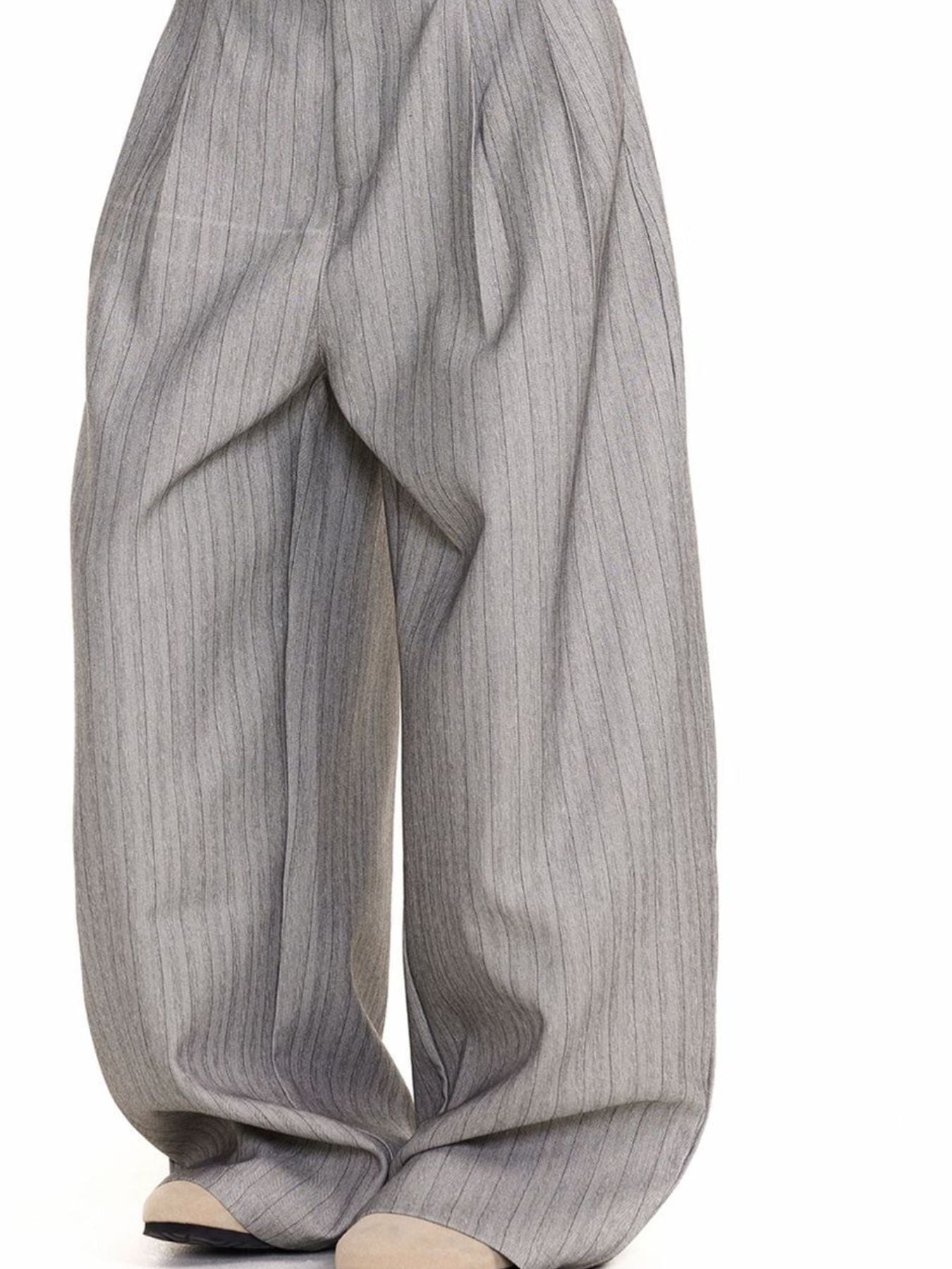Men's grey pinstripe wide leg sweatpants with a flowy fit.