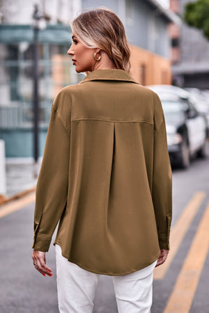 Oversized utility shirt in camel with pleated back detail and button cuffs.