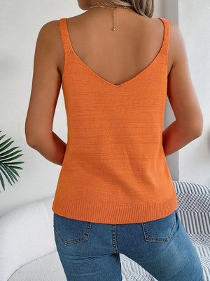 Orange diamond knit tank top with V-neck and buckle straps.