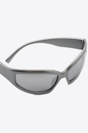 Mid Gray sculpted shield sunglasses with a sleek, modern design.