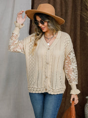 Tan knit cardigan with lace sleeves and button front.