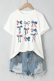 White t-shirt with a montage of patriotic bows in red, white, and blue flag print.
