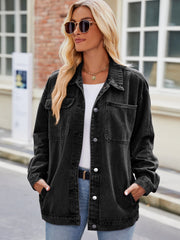 Black oversized denim shacket with button-down front and chest pockets.
