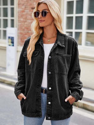 Black oversized denim shacket with button-down front and chest pockets.