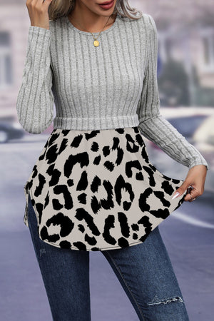 Ribbed knit grey peplum blouse with leopard print hem and crew neck.