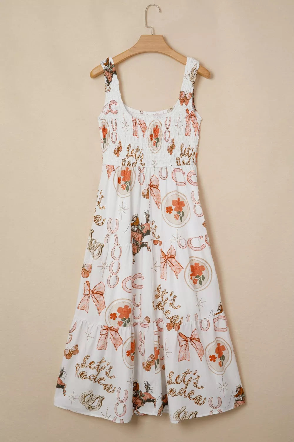 Cowboy Charm U-neck Midi Dress in white cotton blend with playful rodeo print, smocked bodice, and tiered skirt.