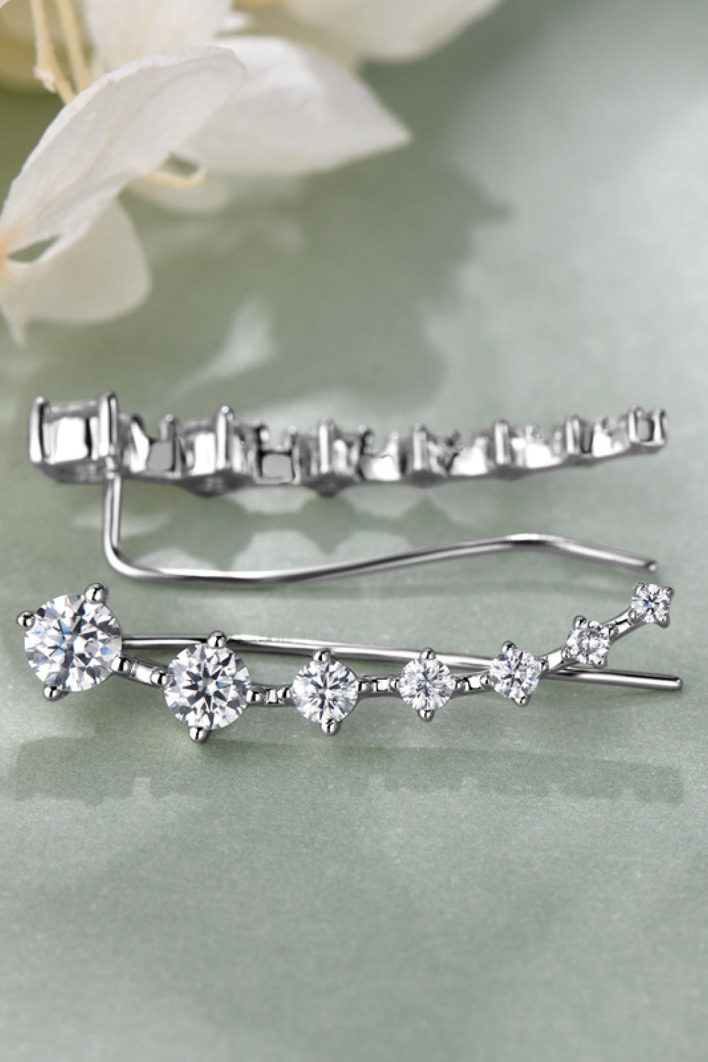 Silver ear climbers with sparkling stones, elegant climbing earrings.