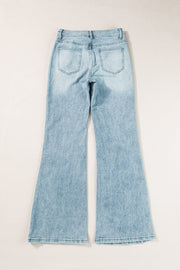 High-waisted palazzo flare denim jeans in medium wash, showing back pockets and flared legs.