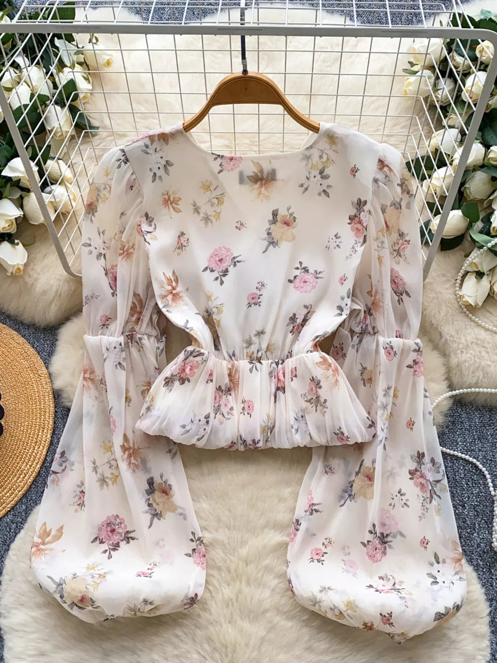 Chiffon floral blouse with balloon sleeves and cropped hem