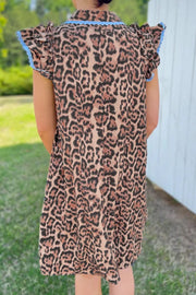 Leopard print cotton mini dress with ruffled sleeves and blue lace trim.