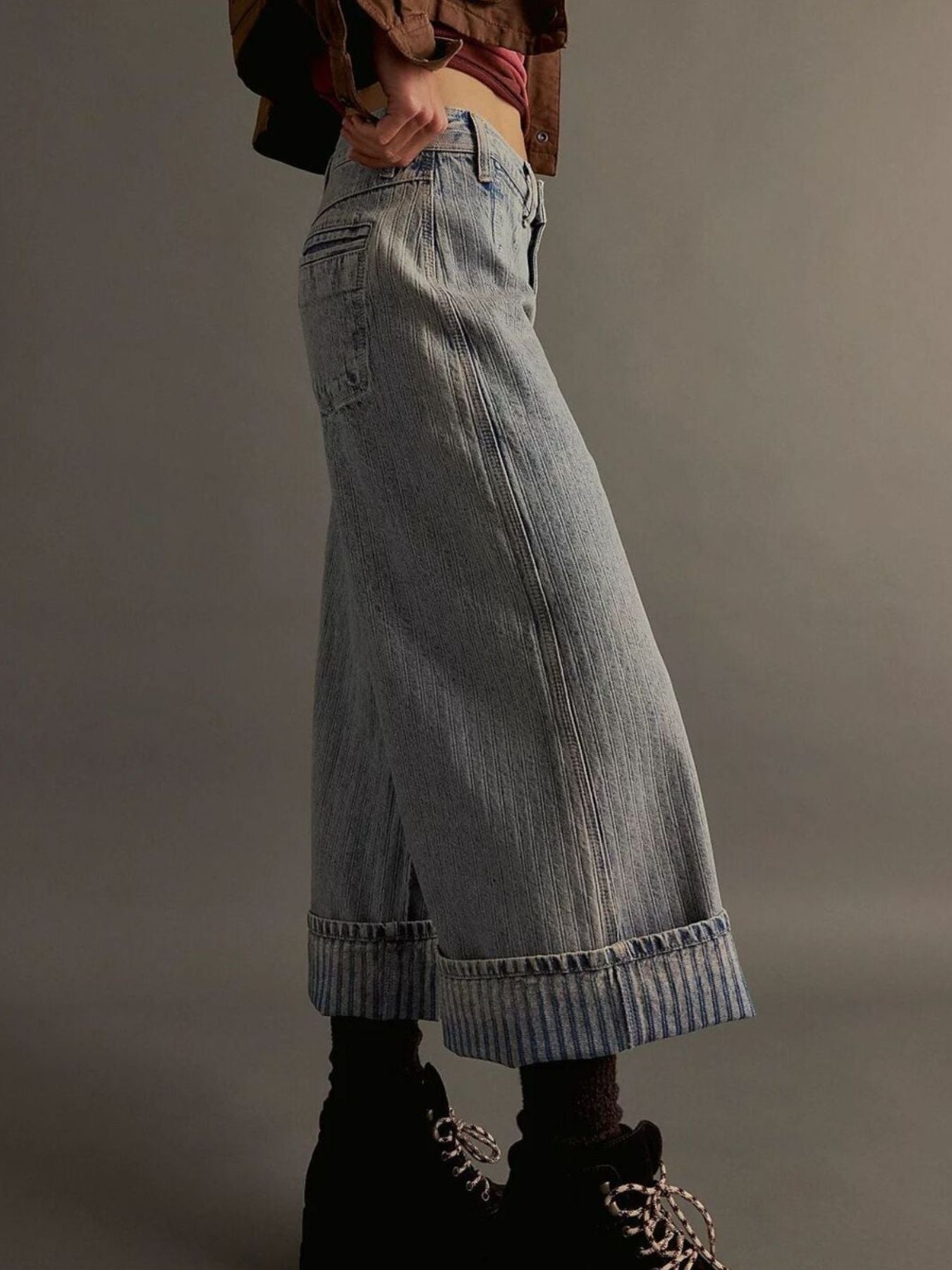 Light blue cotton blend high-waisted cropped jeans with wide legs and cuffed hems.