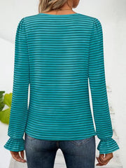 Teal striped blouse with ruffle cuffs and long sleeves.