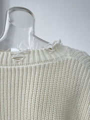 Off white distressed cotton sweater with deconstructed details and frayed neckline.