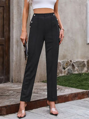 Black tailored trousers with elastic waist and button detail