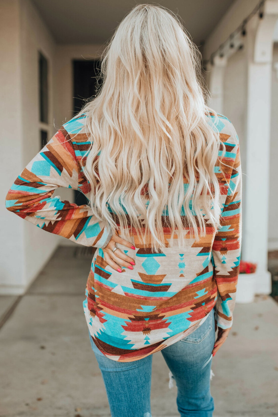 Southwestern print button-down blouse in multicolor with long sleeves and a casual fit.