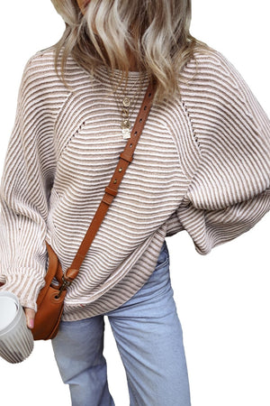Textured stripe batwing knit sweater in taupe with a relaxed fit and dropped shoulders.
