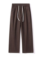 Relaxed fit drawstring pants in coffee brown with white drawstring and elastic waist.