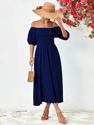 Dark blue off-shoulder midi dress with gathered bodice and balloon sleeves.