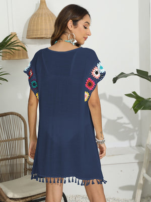 Dark blue tunic with crochet floral sleeves and tassel hem