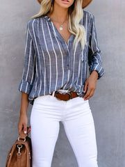 Dusty blue striped V-neck buttoned blouse with rolled sleeves.