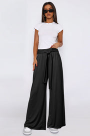 Black soft drape palazzo trousers with tie waist and wide leg