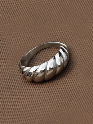 Silver sculpted steel croissant ring with twisted band detail