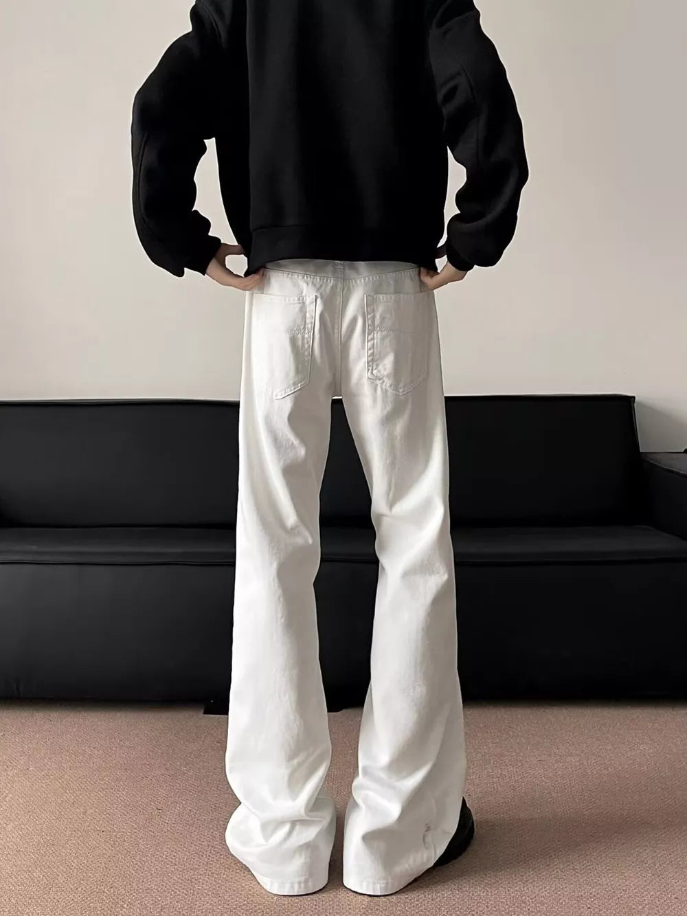 Essential Oversized Wide-leg Sweatpants in white with a relaxed fit and two back pockets.