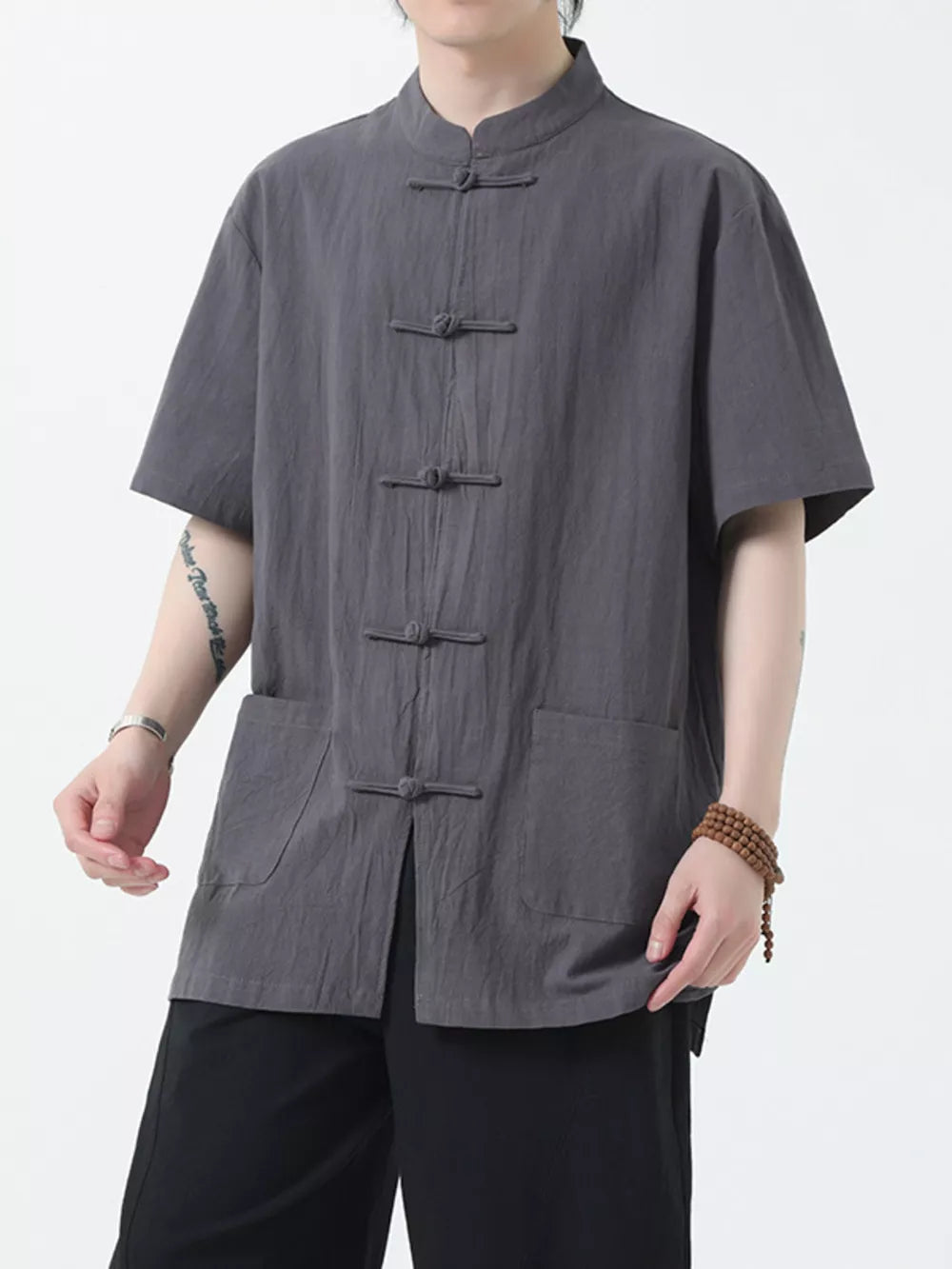 Dark Gray short-sleeve cotton shirt with mandarin collar and frog button closure, featuring two front pockets.