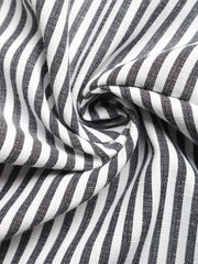 Striped cotton blend romper fabric detail, black and white vertical stripes.