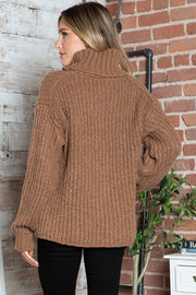 Brown chunky ribbed turtleneck sweater with relaxed fit and long sleeves.
