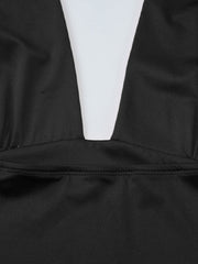 Black halter neck tie cami top with deep v-neck and adjustable ties.