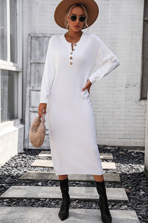 White textured knit henley midi dress with button detail and long sleeves.