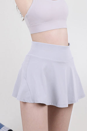 Light purple flared skort with a high-waisted fit, shown from the waist down.