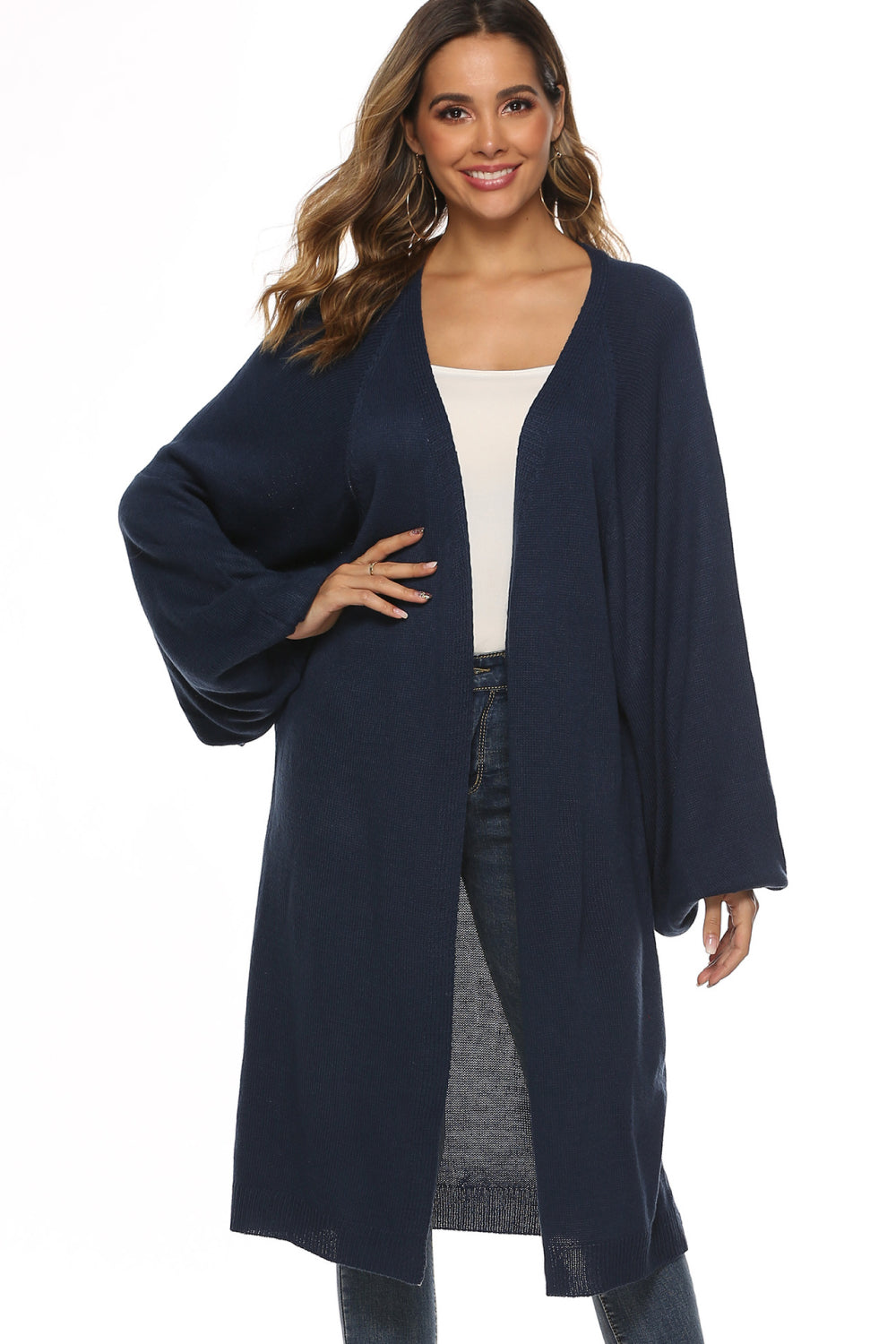 Dark blue oversized sleeve maxi knit cardigan with open front and relaxed fit.