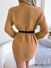 Textured knit bodycon mini dress in burnt coral with a black belt.