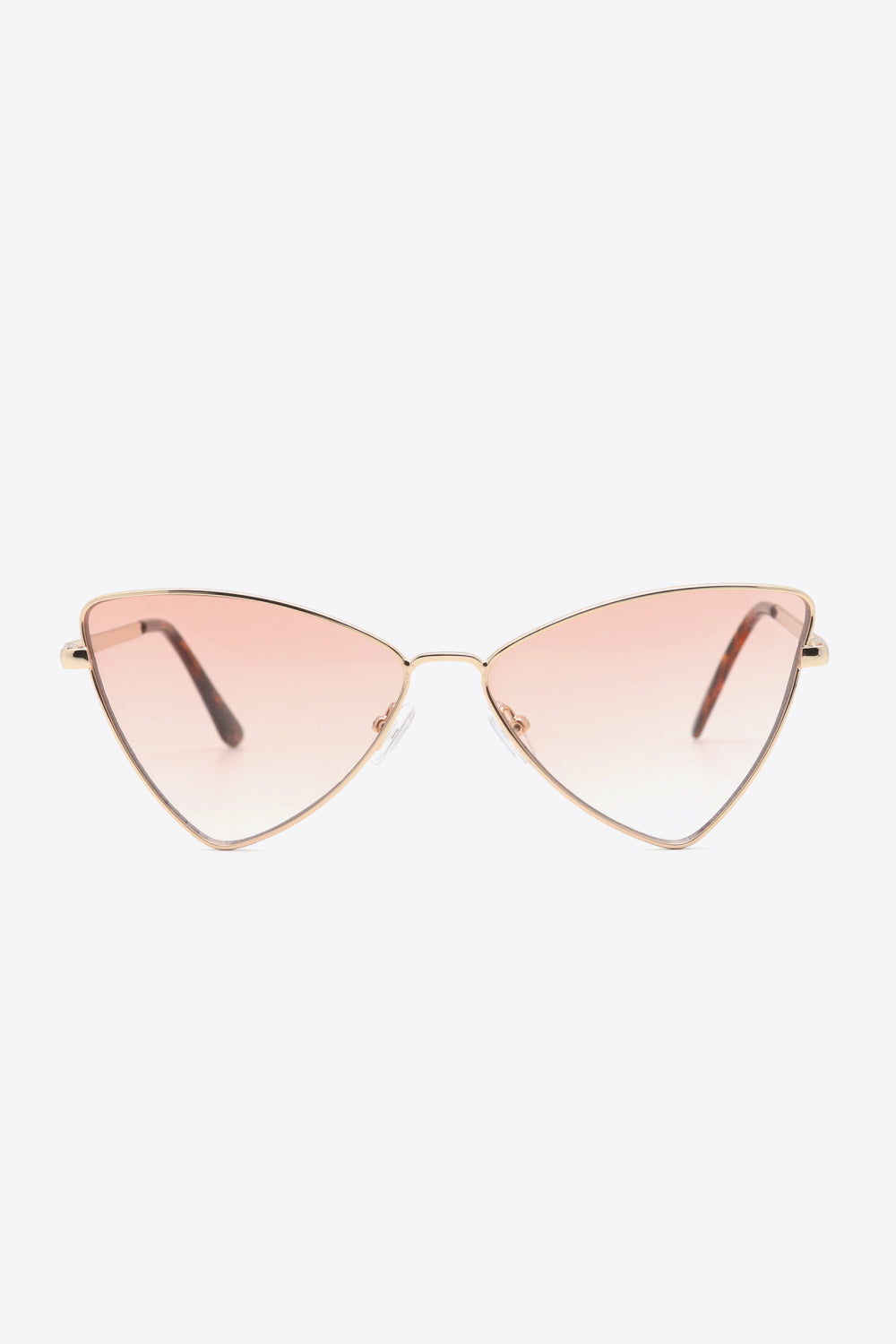 Angular cat-eye sunglasses with gradient brown lenses and gold metal frames.