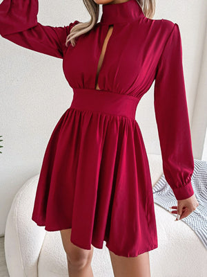 Red fit-and-flare mini dress with keyhole neckline and long sleeves