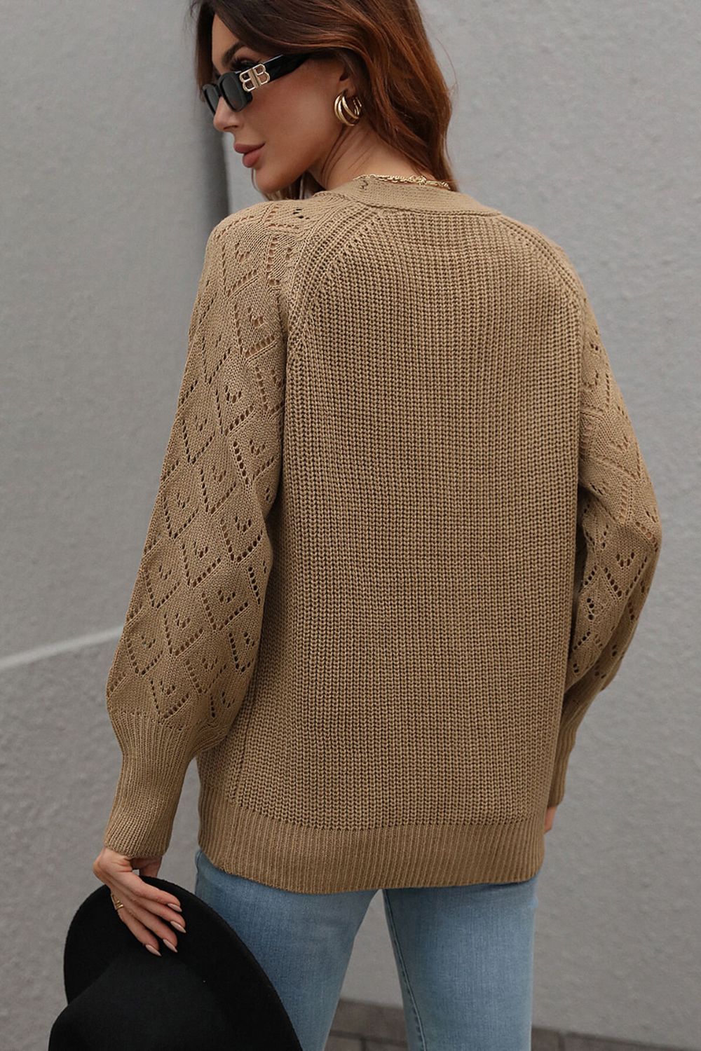 Khaki diamond knit button-down cardigan with textured sleeves and ribbed trim.